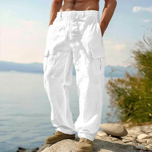 Men's solid colour cotton wide-leg casual trousers with an elastic mid waist on a neutral background.