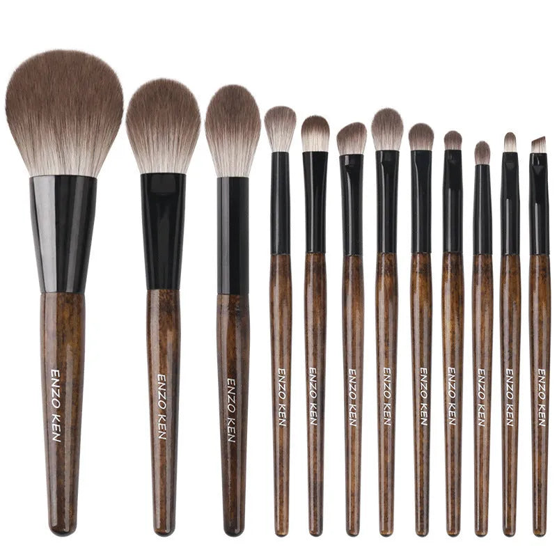12-piece makeup brush set with wooden handles in a PU carrying case