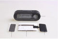 Black electronic car dashboard clock and thermometer unit with digital LED display on an adjustable bracket.