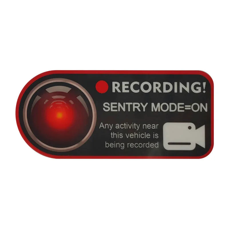 Tesla Sentry Mode warning sticker showing English text on electrostatic PVC material