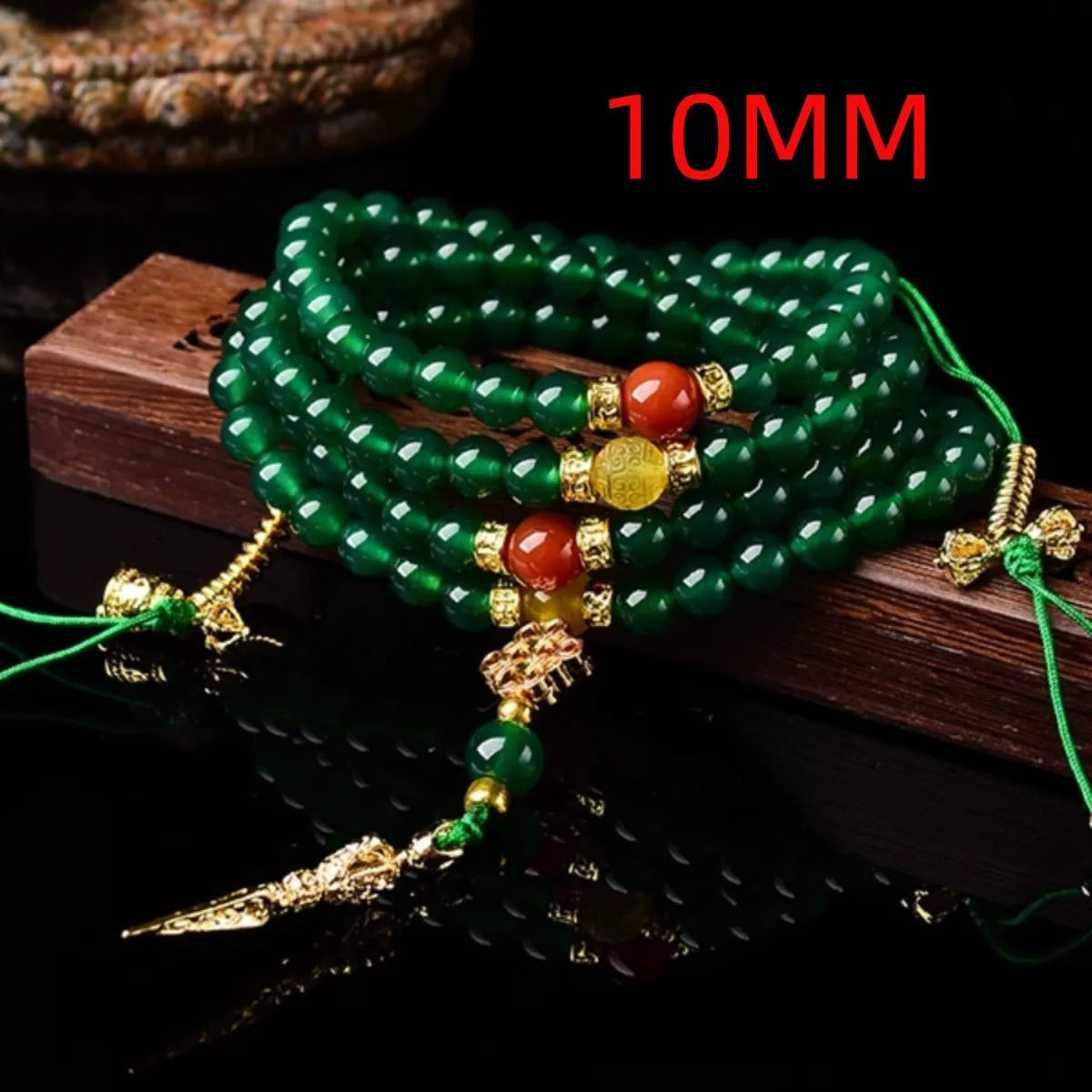 Brazilian green agate multi-strand bracelet showing different bead sizes on a wrist.