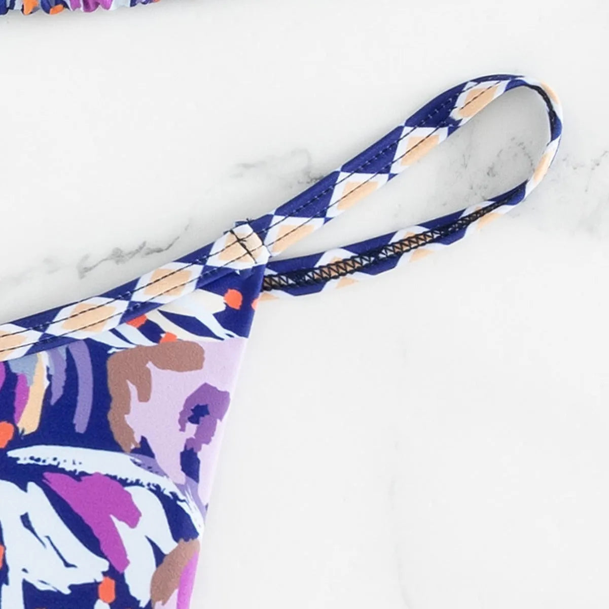 Women's floral print polyester triangle bag style swimsuit with briefs cut