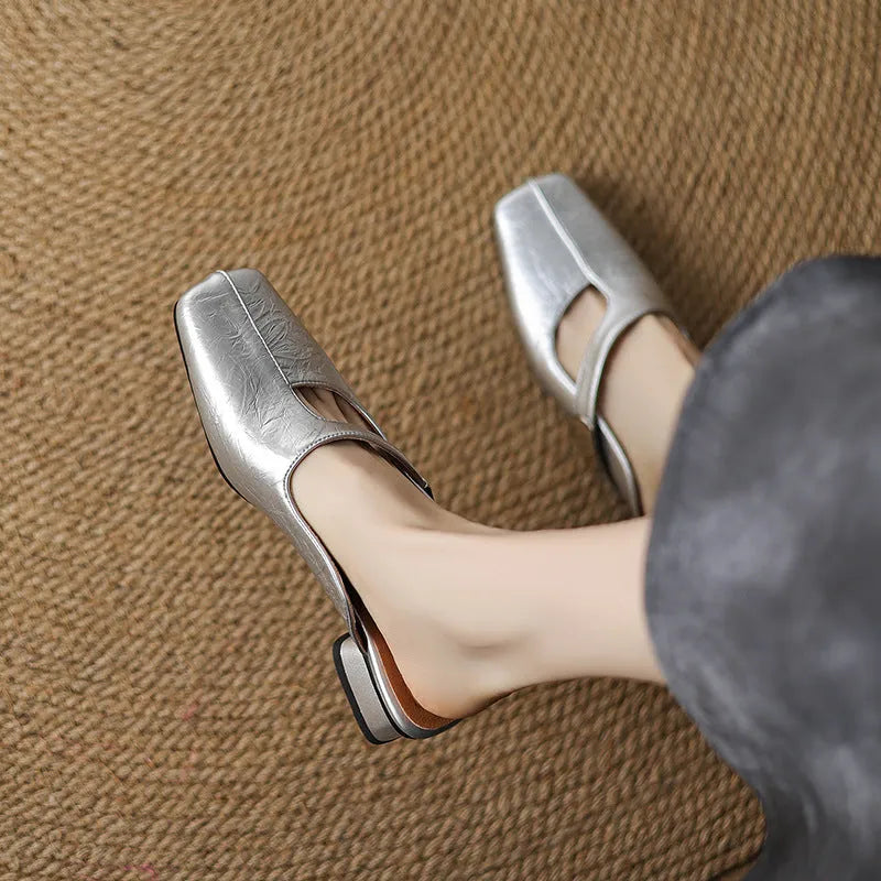 Casual square-toe outdoor slippers in beige with a low heel and rubber sole.