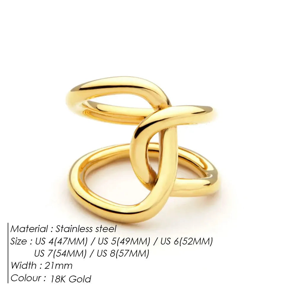 Women's stainless steel knotted geometric adjustable opening ring in gold or silver tone on a hand.