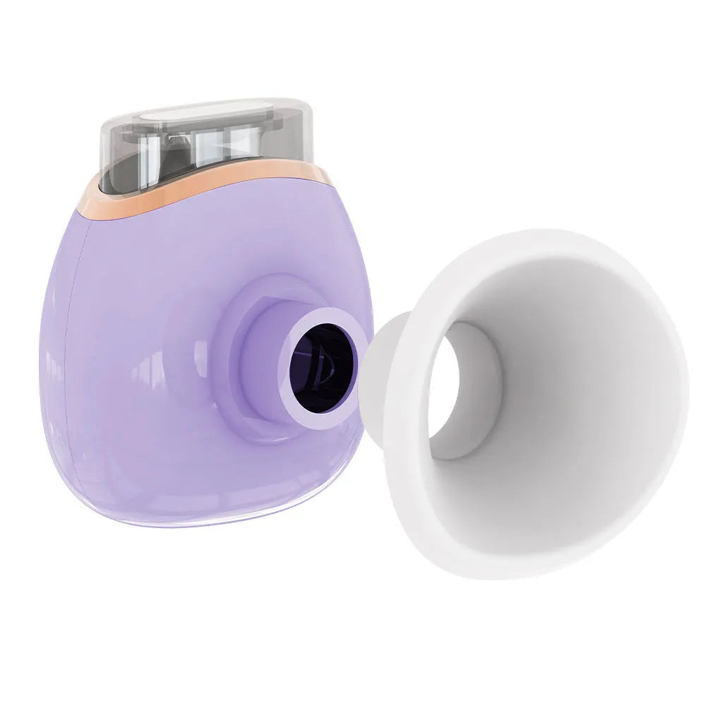 White and purple portable eye humidifier device with USB charging cable on a table.