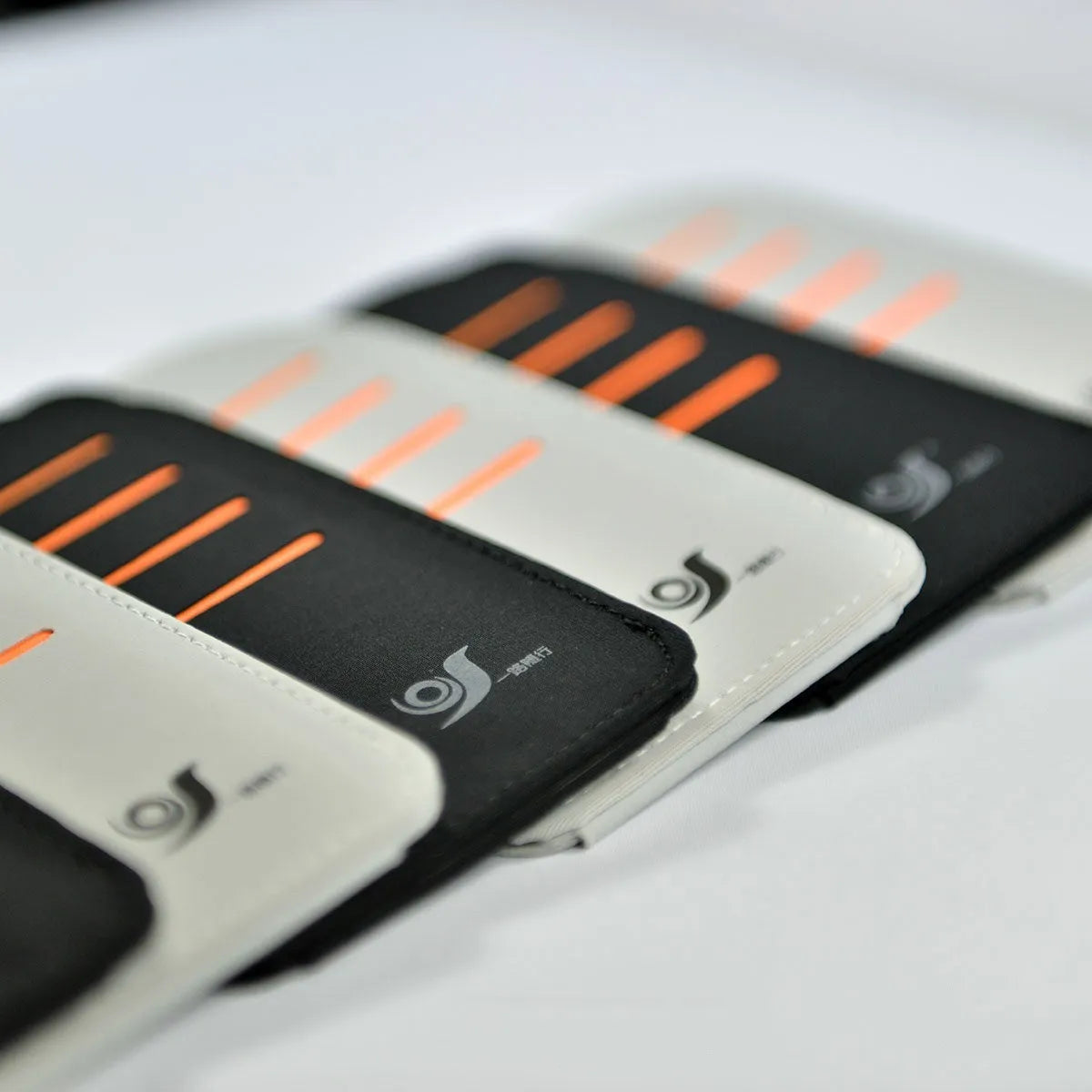 Car sun visor shading panels with storage bag showing four tablets for vehicle windscreen protection