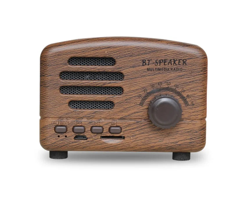 Vintage wood finish bluetooth speaker in pink, black, and wood grain colour options showing compact design