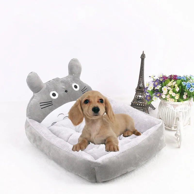 Cartoon-style washable pet bed for small dogs and cats in plush fabric with raised sides