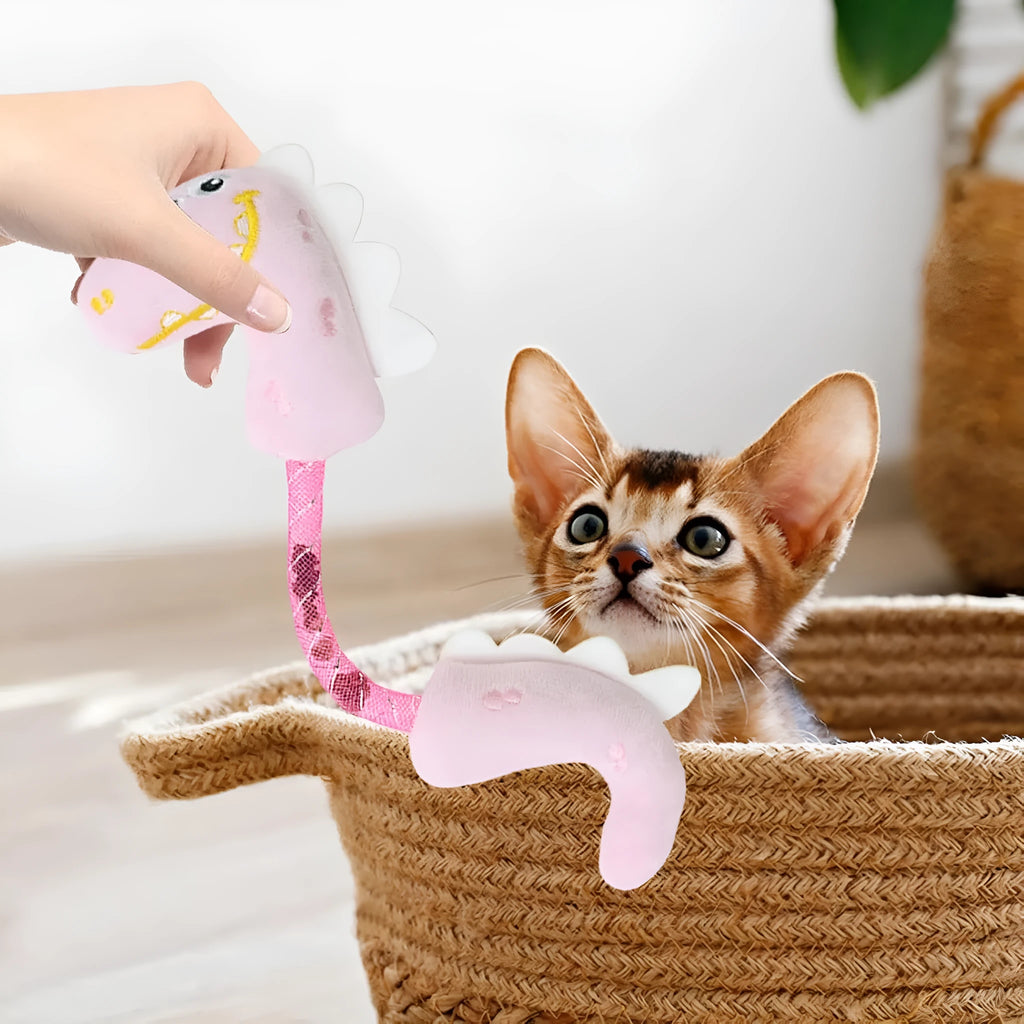 Set of four cat toys including catnip rope, interactive kicker, spring, and plush chew toys in pink, purple, and yellow