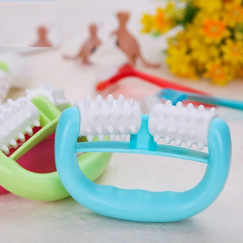 Handheld anti-cellulite massager roller with TPE dot wheels in blue colour on white background