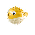 Yellow vinyl fish-shaped dog chew toy with textured surface for aggressive chewers