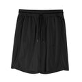 Man wearing black loose-fit quick-dry mesh fitness shorts with an elastic waistband.