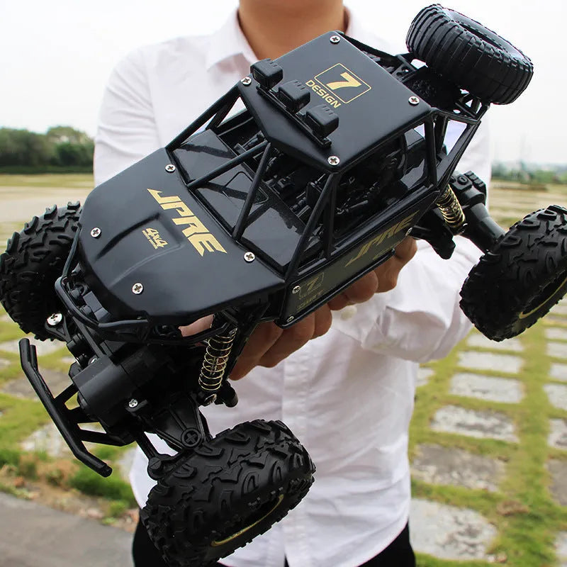Large black 4WD remote control climbing car with 2.4G wireless controller