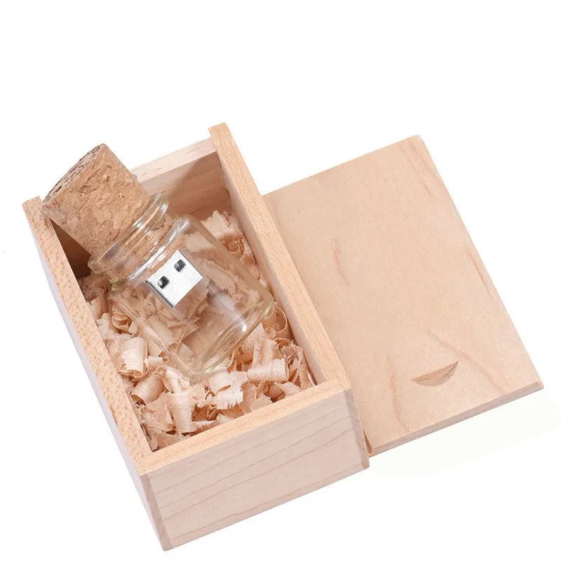 Chocolate-brown wooden drift bottle-shaped USB flash drive with custom lettering graphics on a wooden disk.