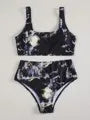 Women's marble tie-dye print high-waisted bikini set with U-neck top on a mannequin.
