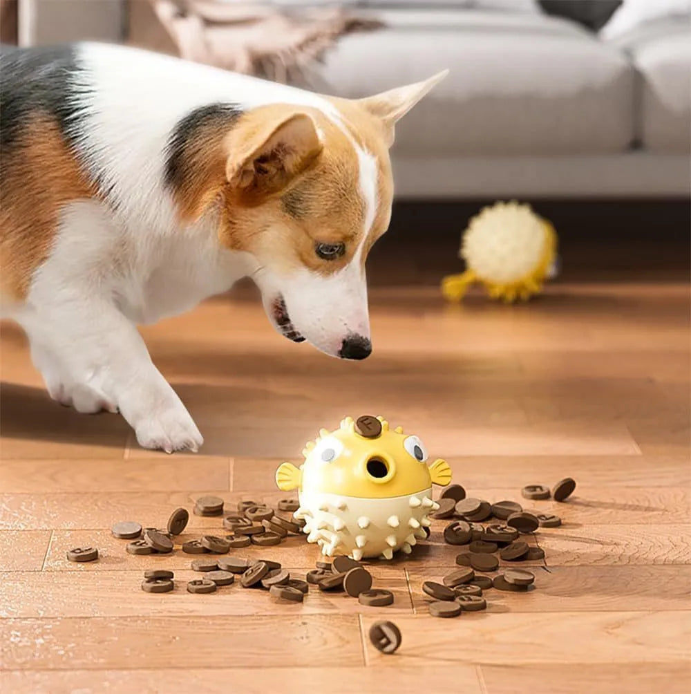 Green fish-shaped interactive dog toy with textured surface for medium and large breeds