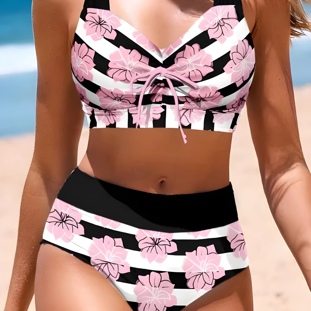 Black women's two-piece bikini swimsuit with printed belly cover design.