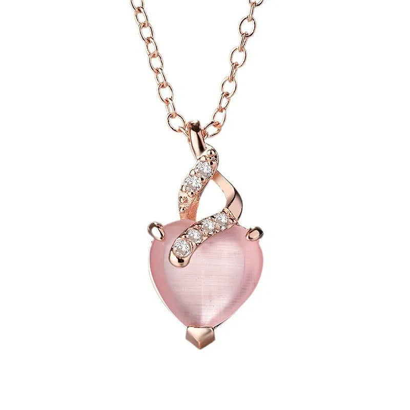 Women's heart-shaped pink crystal pendant necklace with rose gold cross chain
