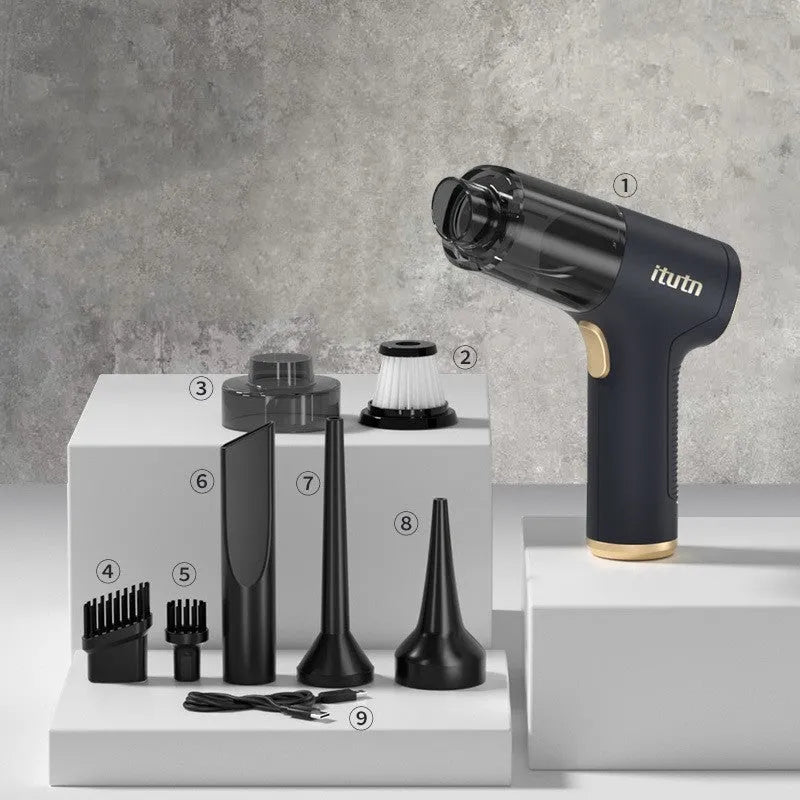 Black wireless car vacuum cleaner with multiple nozzle attachments including brushes and suction nozzles