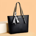 Large capacity women's shoulder bag in PU with horizontal square shape, double shoulder straps, printed pattern, black colour option