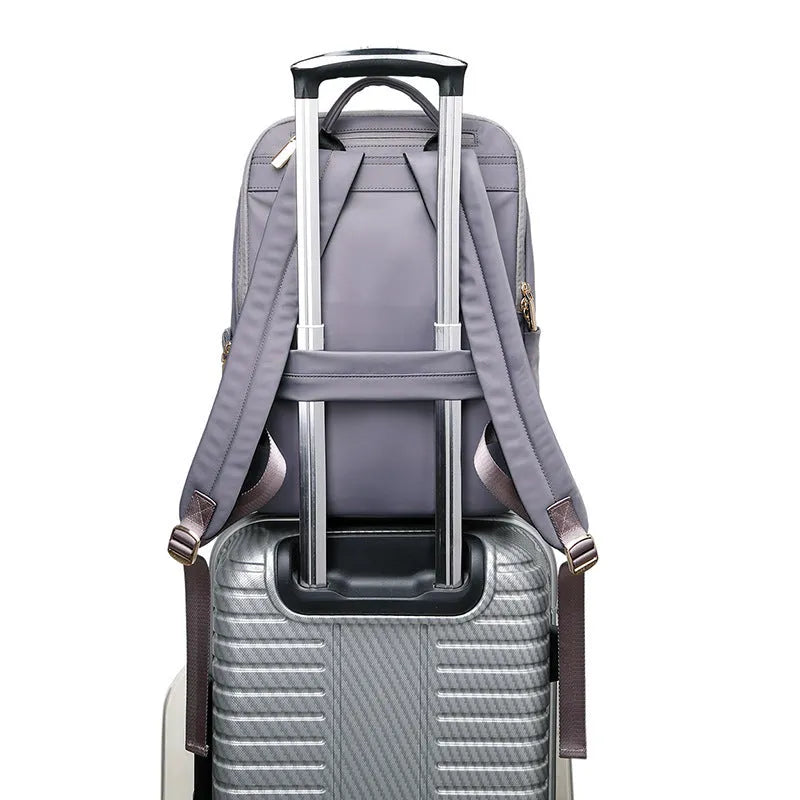 Oxford cloth women's backpack in black or purplish grey with large capacity and multiple functional features
