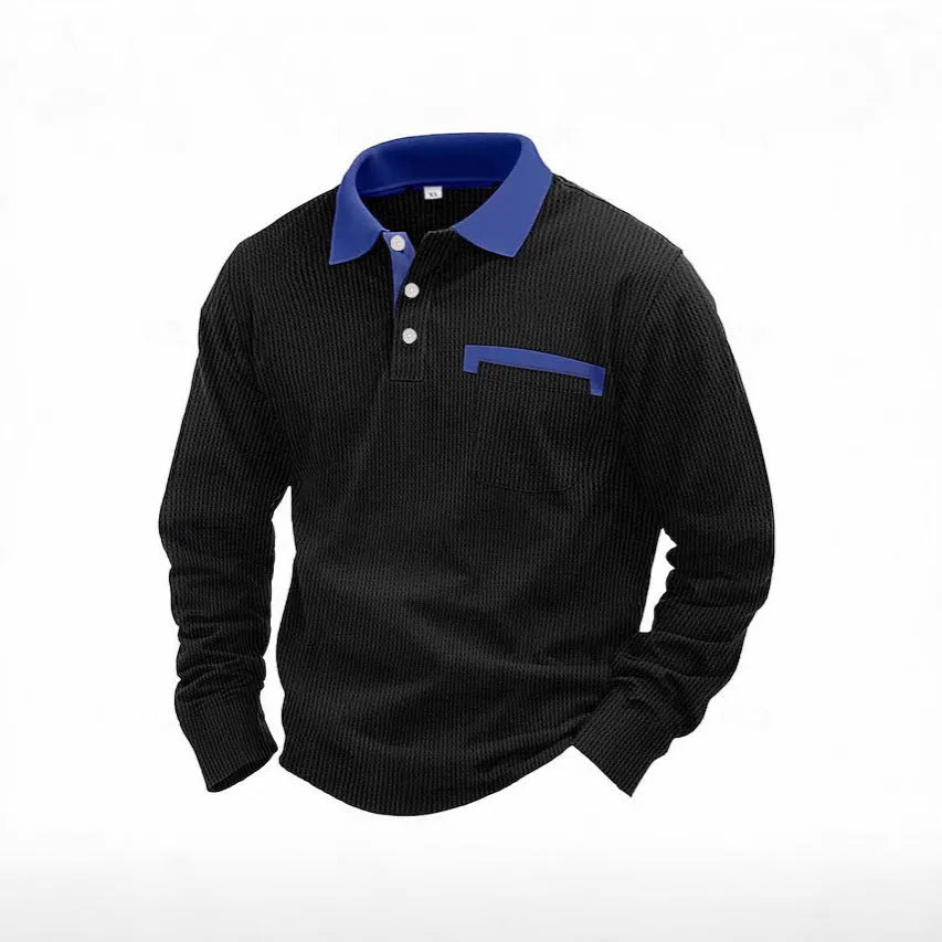 Man wearing a long-sleeved waffle-texture polo shirt in a solid colour with an asymmetric design detail.