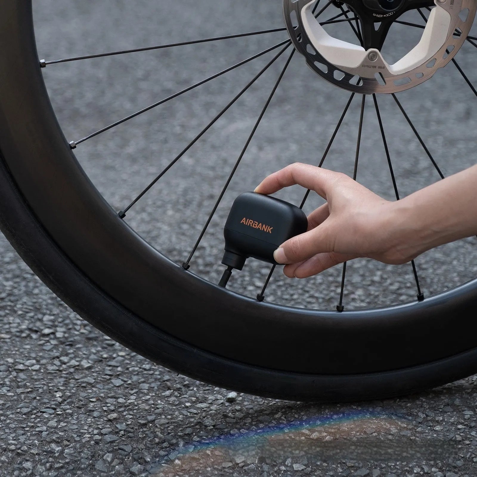 Black AS100 USB rechargeable mini electric pump for bicycle tyres with charging cable and waterproof bag