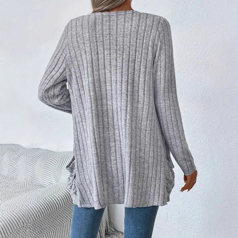 Solid colour long sleeve cardigan with pockets in loose fit, available in grandma grey or black