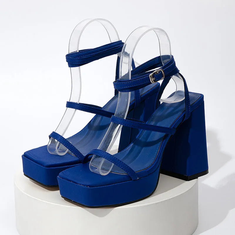 Women's black chunky heel square toe Roman-style PU strap sandals seen from side