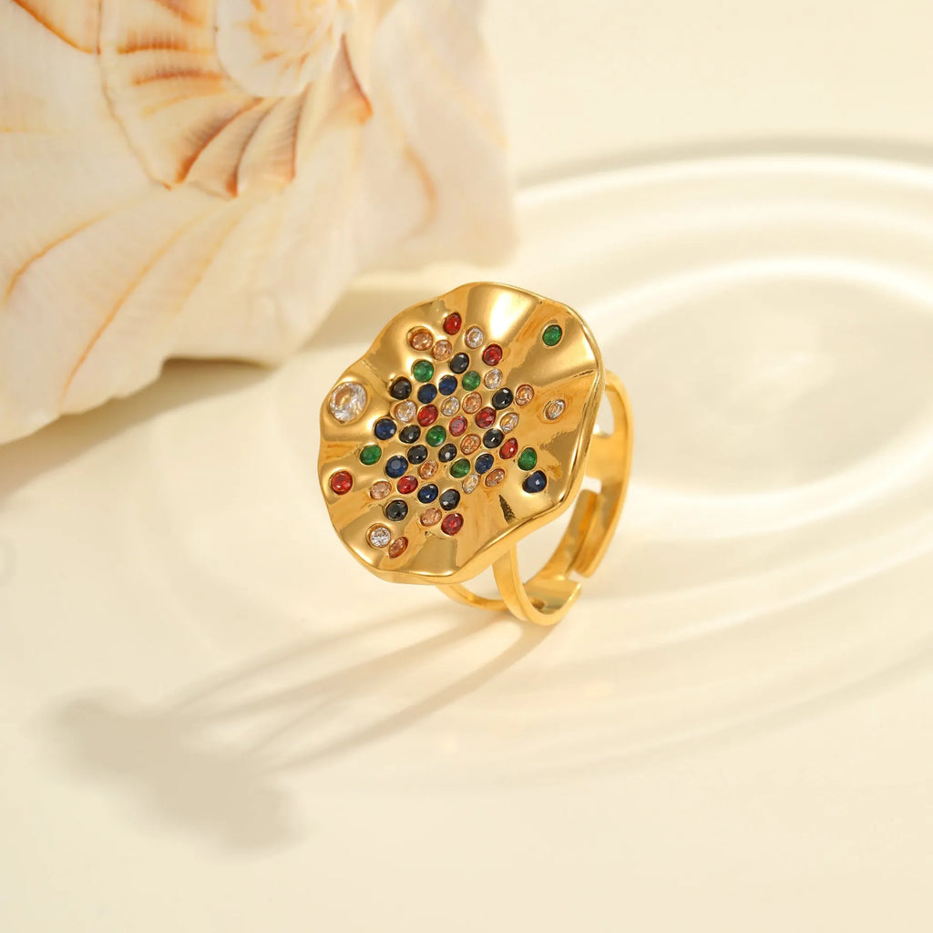 Geometric stainless steel ring with colourful crystal inlays and adjustable open mouth design