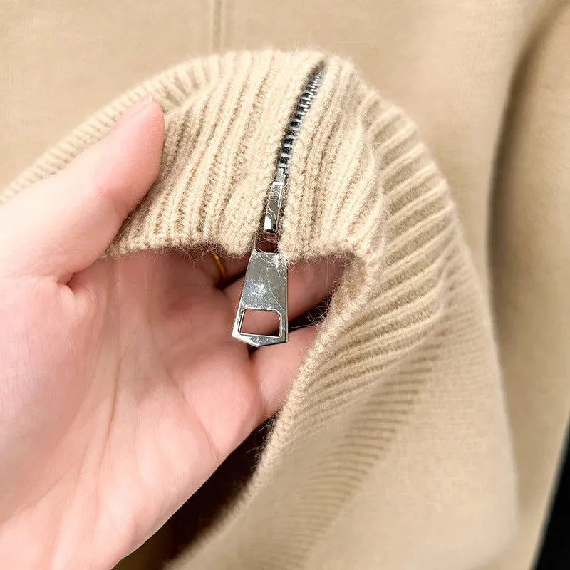 Men's grey knitted zip-up cardigan with high stand collar on hanger