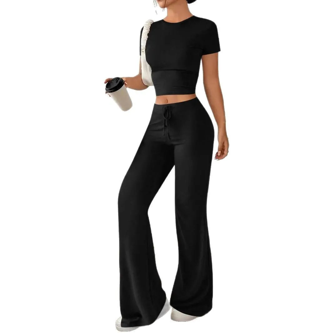 Black polyester trouser suit set with high-waisted trousers and short sleeve V-neck top