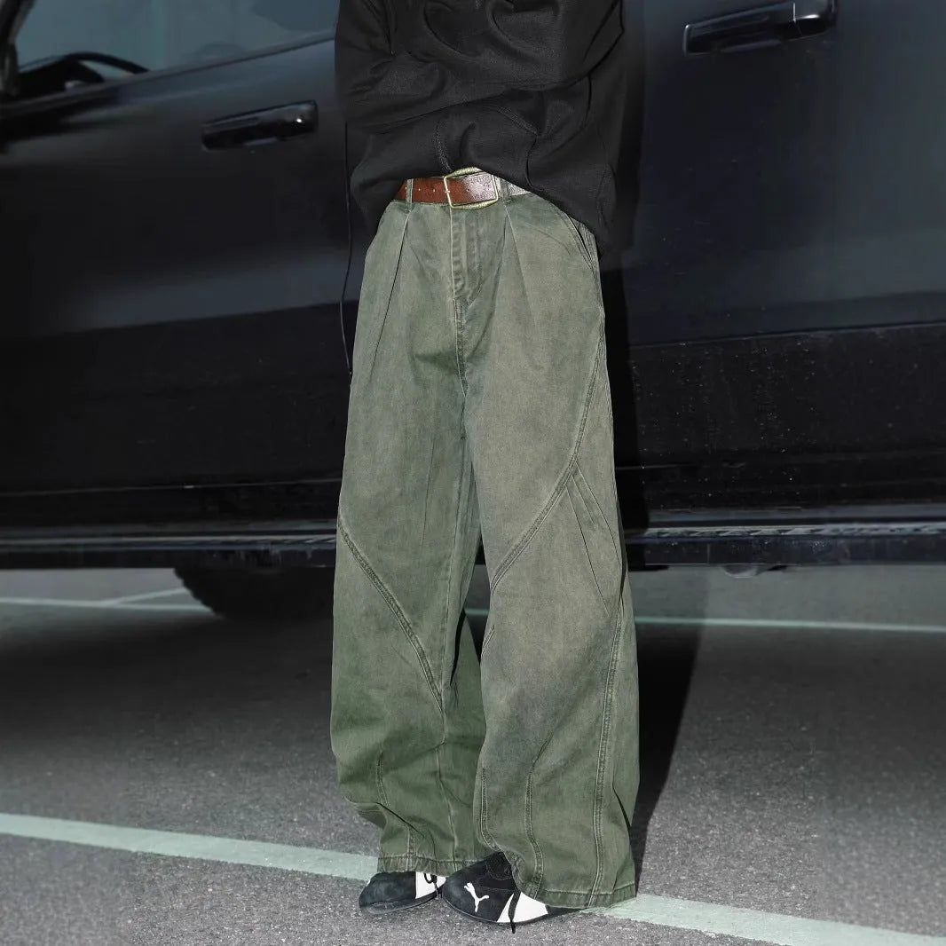 Men's pleated straight leg trousers in stripe patterns showing loose fit and micro elastic fabric