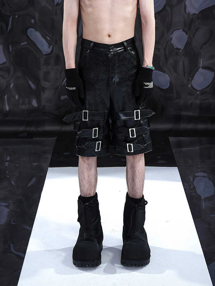 Men's black PU leather cropped shorts with leather ring detailing on leg
