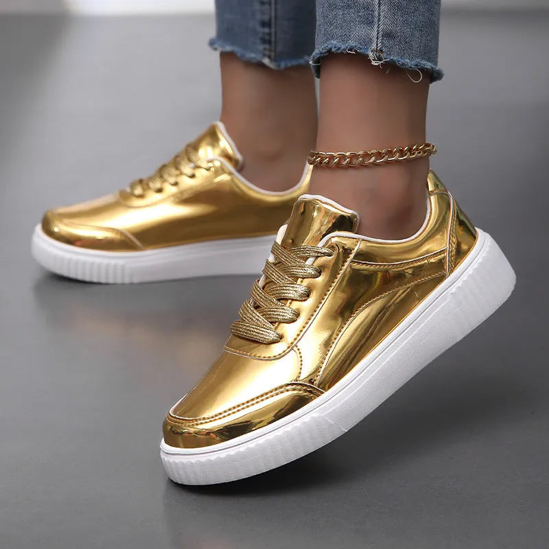 Sparkling gold sequinned platform sneakers with a round toe and thick MD sole.