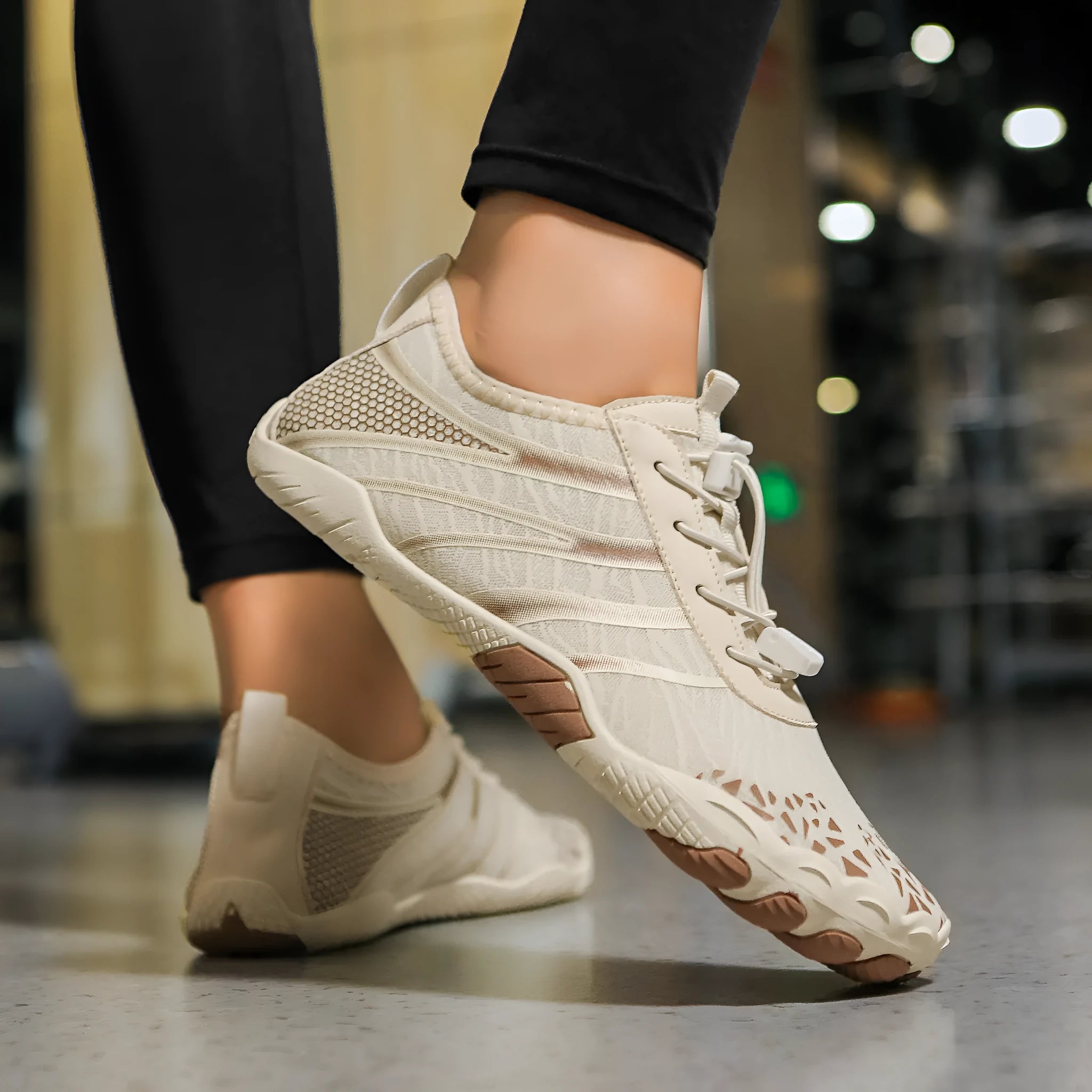 Casual unisex beach running shoes with stretch Lycra fabric uppers in beige, shown on a size label.