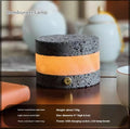Orange volcanic rock USB night lamp with touch dimming and essential oil well, measuring 9cm by 7.5cm.