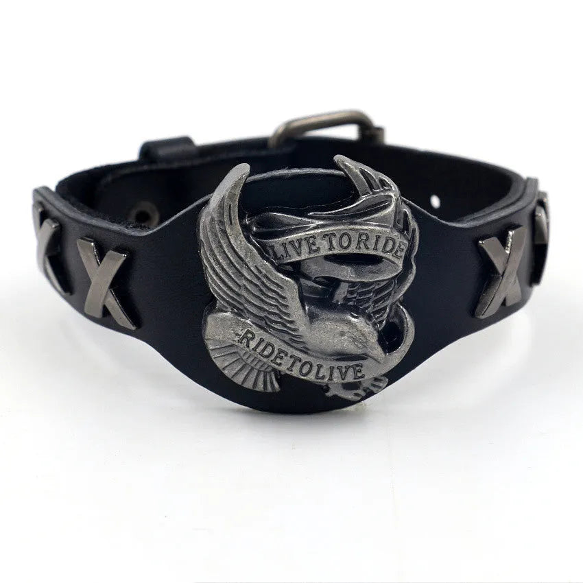 Black leather geometric bracelet with alloy eagle watch-butttom closure, showing varying widths along 26cm length