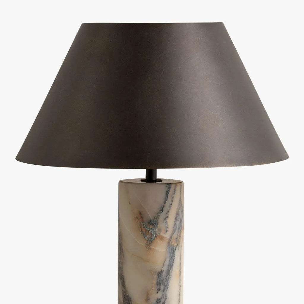 Black marble table lamp with modern design on wooden surface