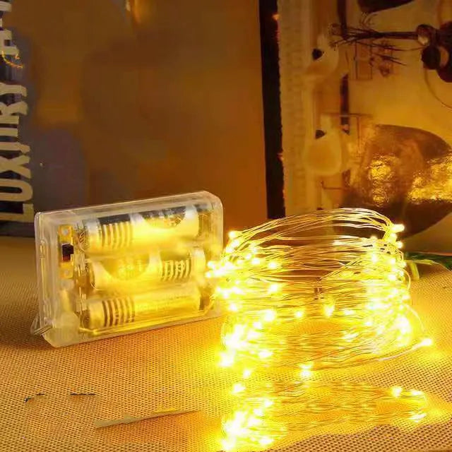12-metre copper wire LED string lights with battery box showing nine colour options