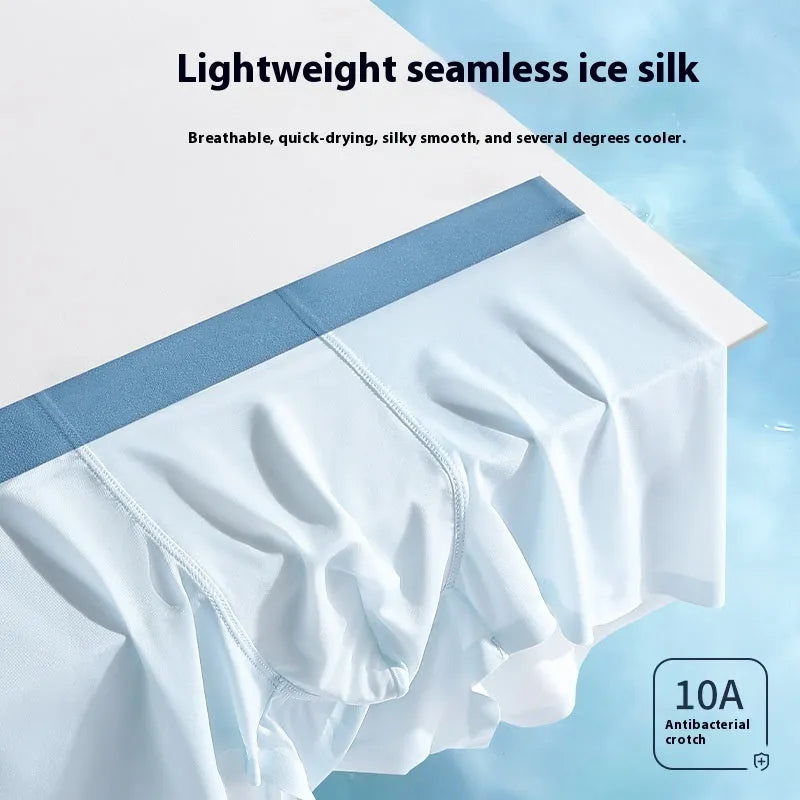 Men's solid colour ice silk shorts with mid waist and seamless design on a neutral background.