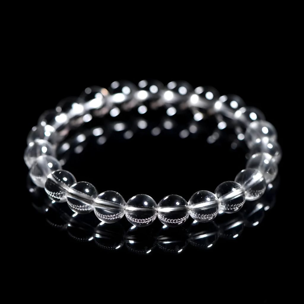 Natural Donghai white water round crystal bead bracelet on a wrist, showing geometric style.
