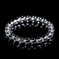 Natural Donghai white water round crystal bead bracelet on a wrist, showing geometric style.