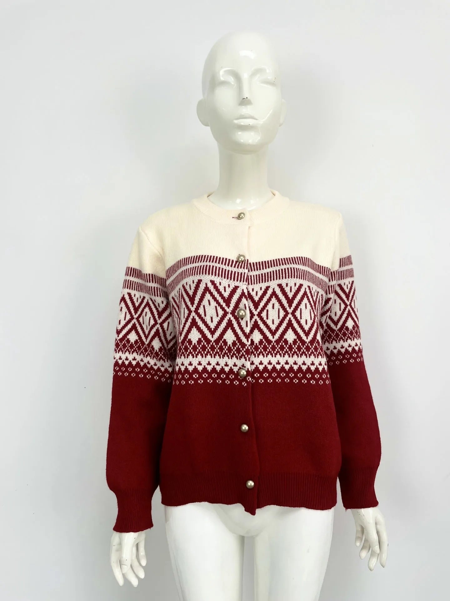 Women's red alpaca wool cardigan with grey and white diamond pattern and long sleeves