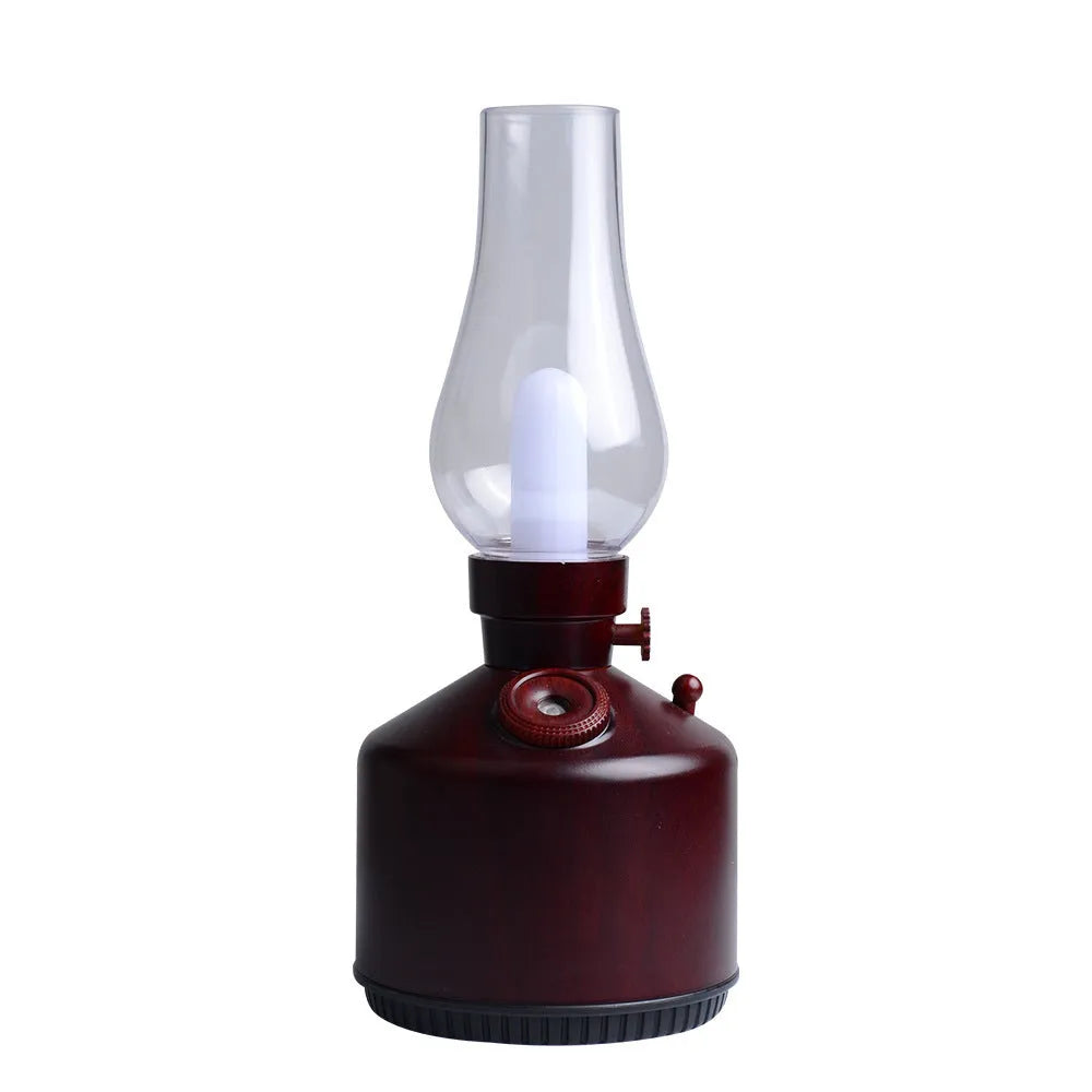 Kerosene lamp ultrasonic humidifier and aroma diffuser with ABS shell in brass color on a table