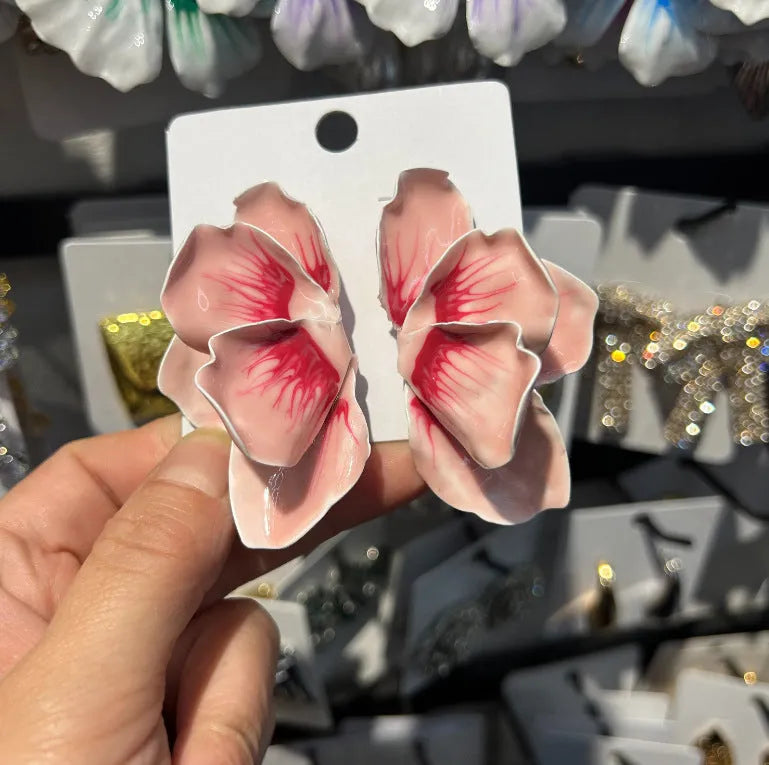 Alloy flower stud earrings with oil-spot glaze finish in blue, green, purple, and rose pastoral styles.