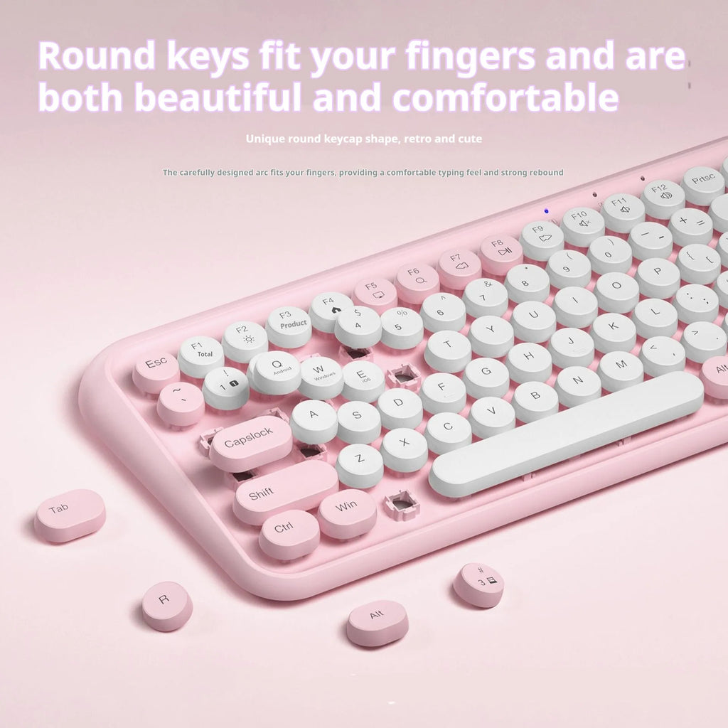 Pink wireless Bluetooth keyboard with mechanical keys and compact design