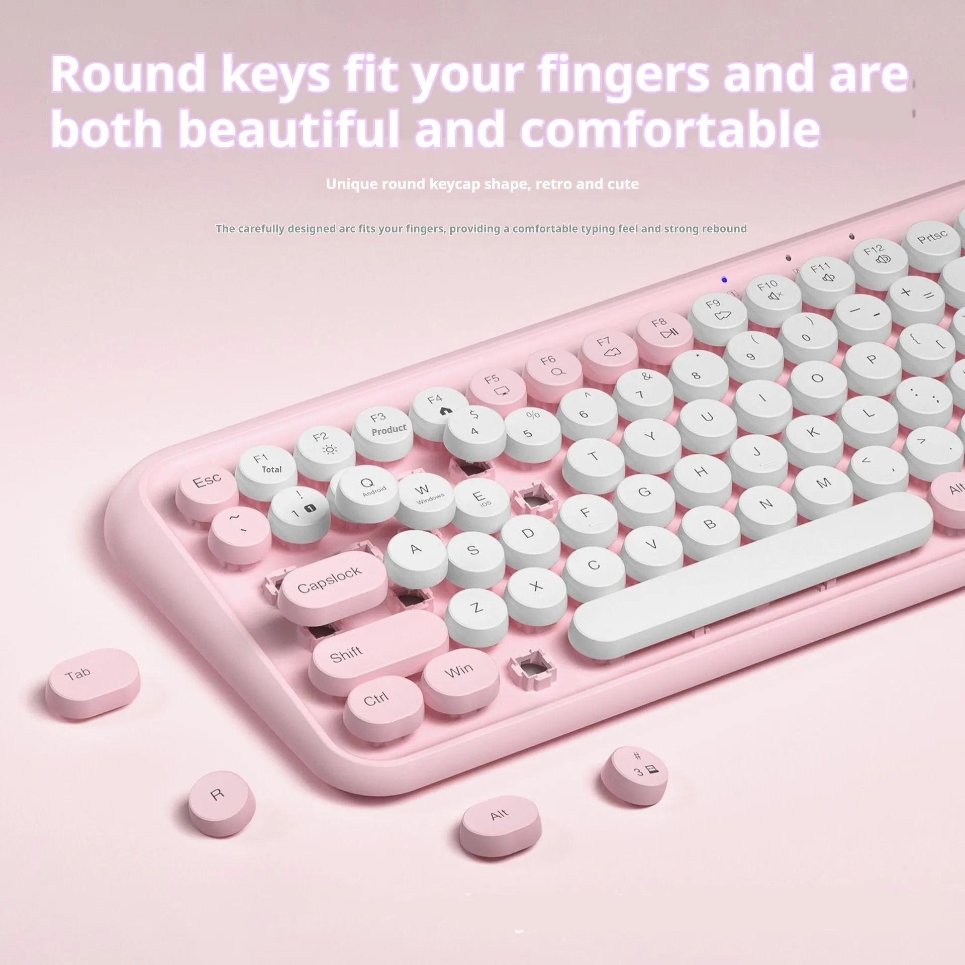 Pink wireless Bluetooth keyboard with mechanical keys and compact design