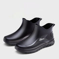 Men's short ankle-height PVC rubber boots with a flat non-slip sole