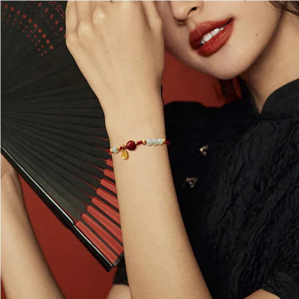 Hetian Jade Cinnabar Red Rope Women's Bracelet made of 925 silver with an adjustable chain.